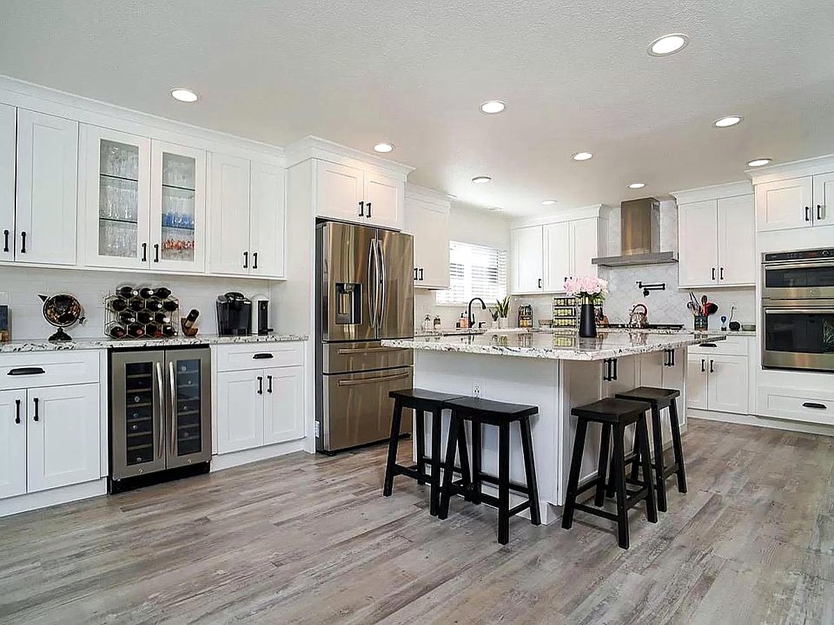 Remodeled chef’s kitchen with generous preparation space