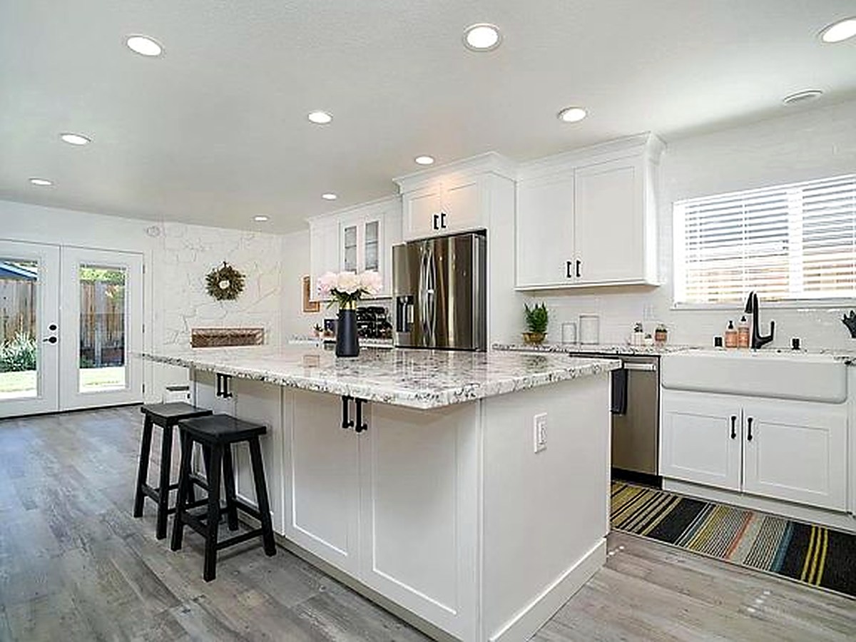 Chef’s kitchen with premium appliances and custom storage